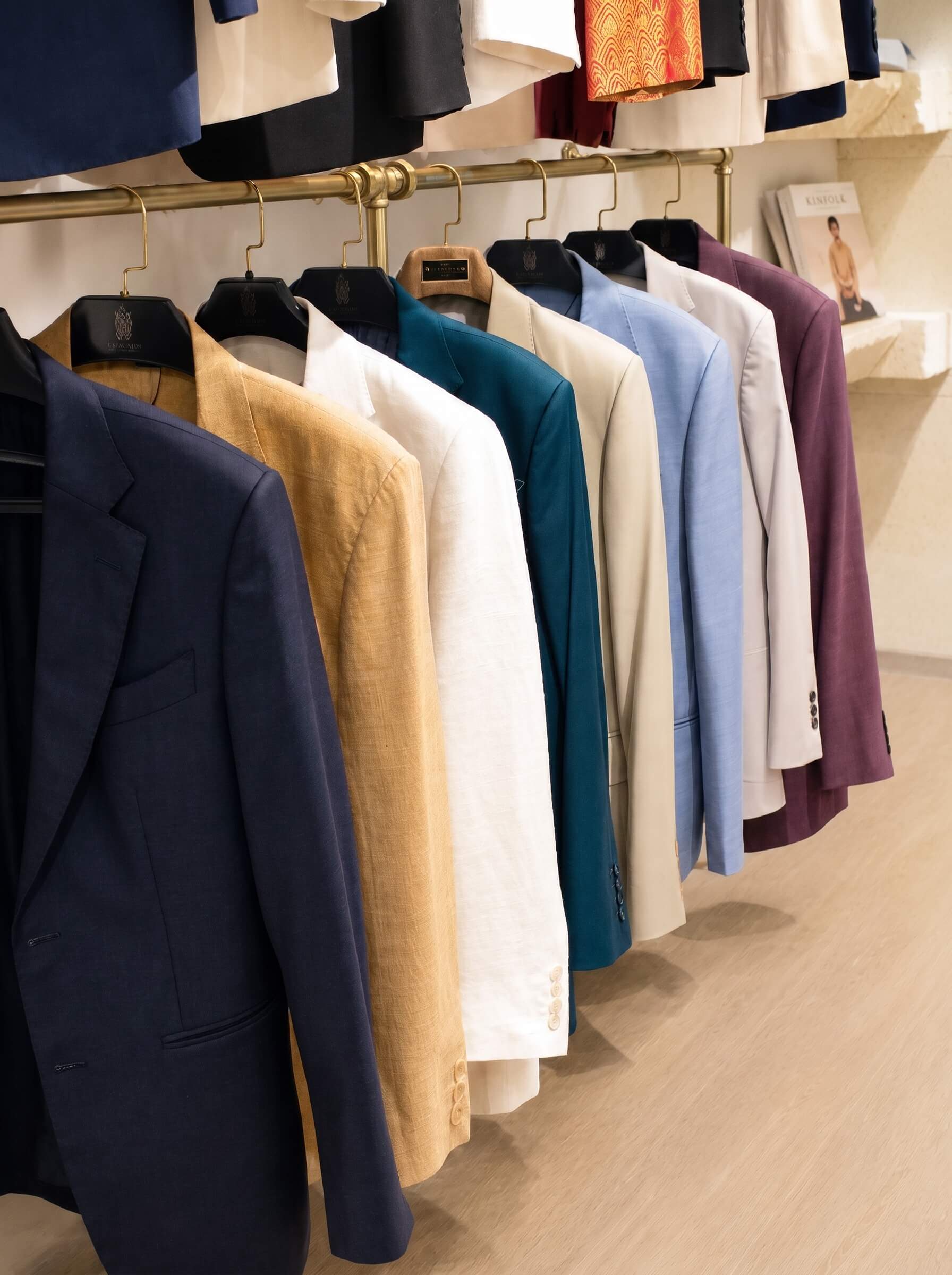 Garments on a showroom rail | Trang phục trên giá tại showroom